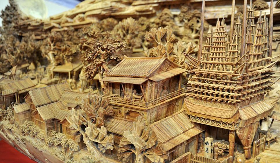 Escultor chinês passa longos 4 anos esculpindo incrível obra prima em madeira 02