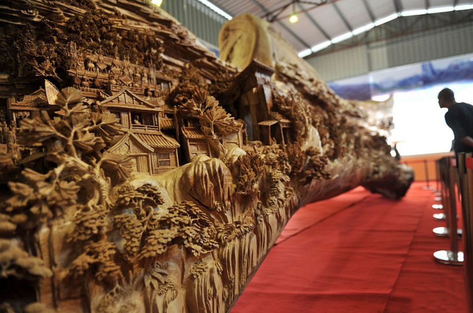 Escultor chinês passa longos 4 anos esculpindo incrível obra prima em madeira 03