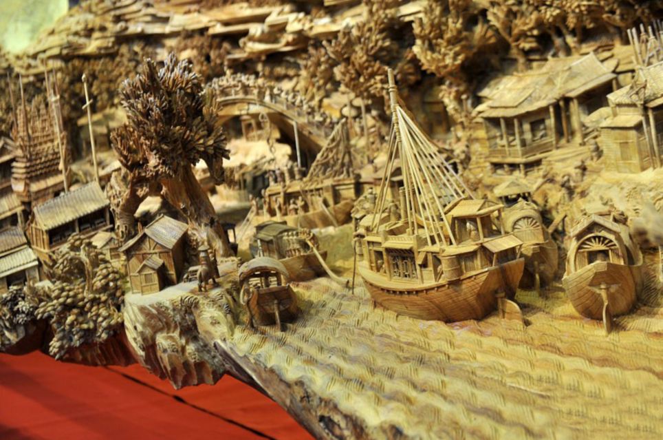 Escultor chinês passa longos 4 anos esculpindo incrível obra prima em madeira 05