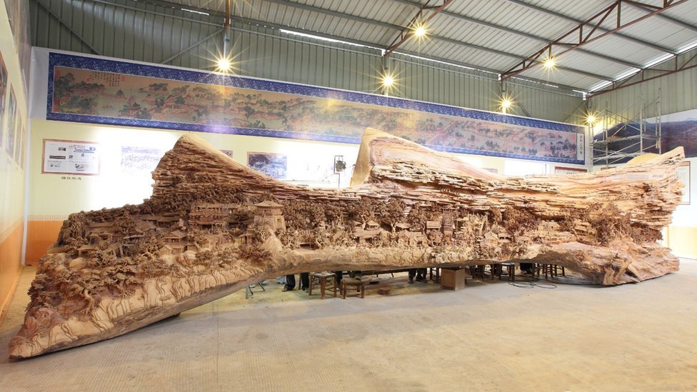 Escultor chinês passa longos 4 anos esculpindo incrível obra prima em madeira 07