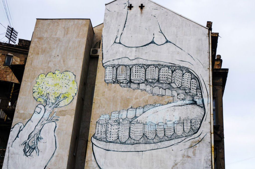 24 eloquentes obras de arte urbana mostrando a desagradvel verdade 03