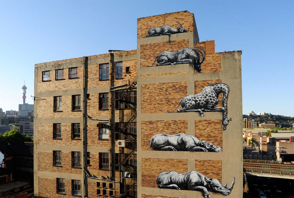 24 eloquentes obras de arte urbana mostrando a desagradvel verdade 10