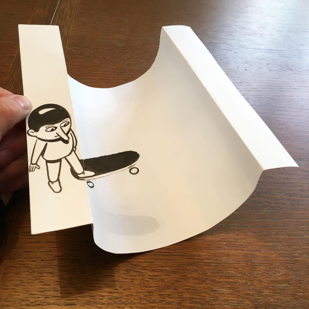 Divertidos doodles tridimensionais criados com dobras e rasgos em papel 05