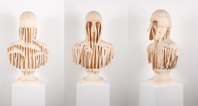 Incríveis esculturas de madeira entalhadas à mão de figuras surreais 04