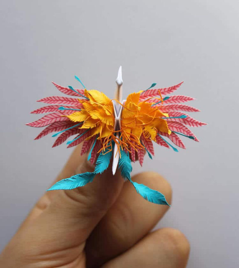 Este artista cria elegantes garas de papel compostos por intrivados cortes dobras e flores 12