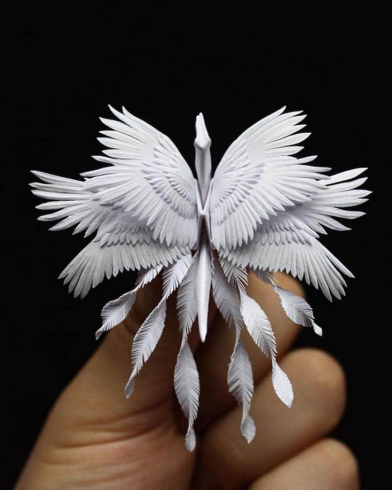 Este artista cria elegantes garas de papel compostos por intrivados cortes dobras e flores 14