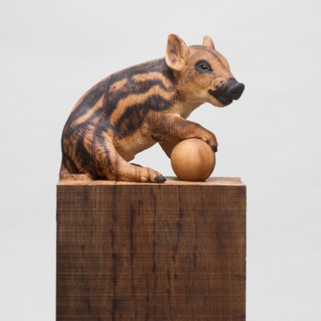 Artista transforma troncos de árvores em esculturas de animais ultrarrealistas 08
