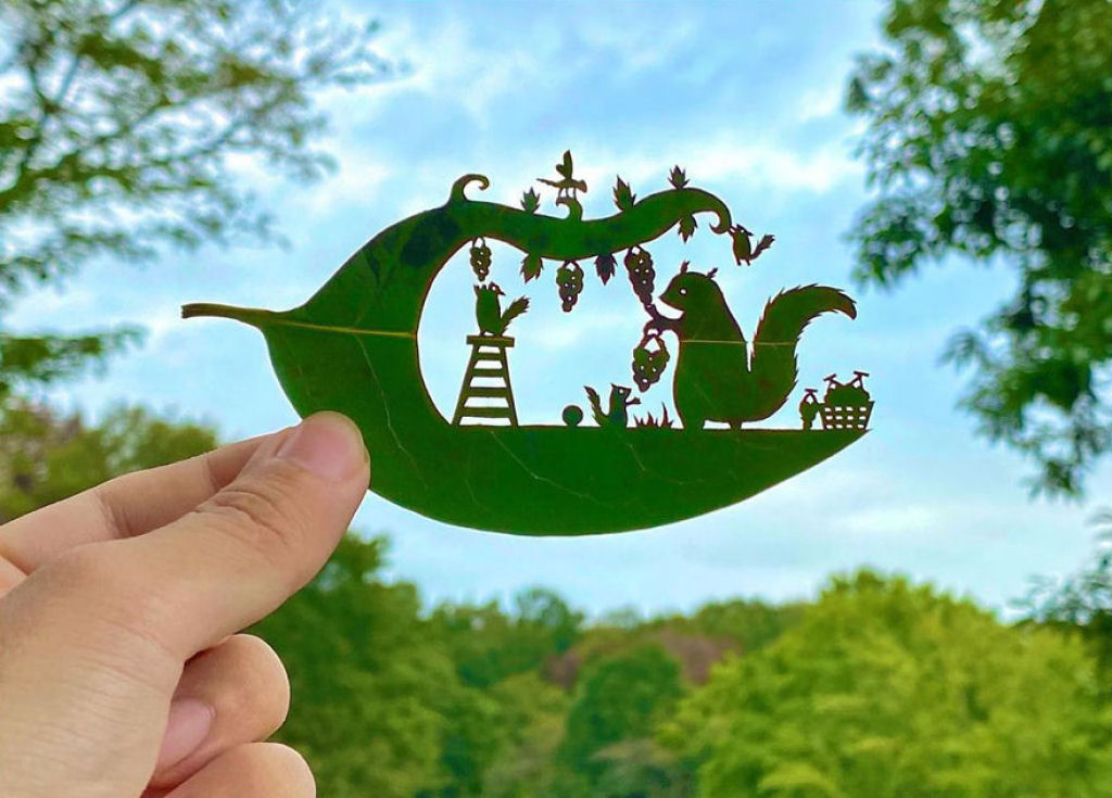 Artista japonês cria intrincadas cenas nas folhas de árvores 14