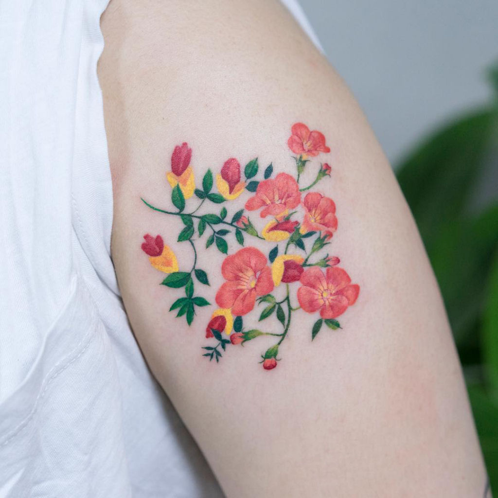 Tatuagens profusamente coloridas assemelham-se a pinturas delicadas de aquarela sobre a pele 09
