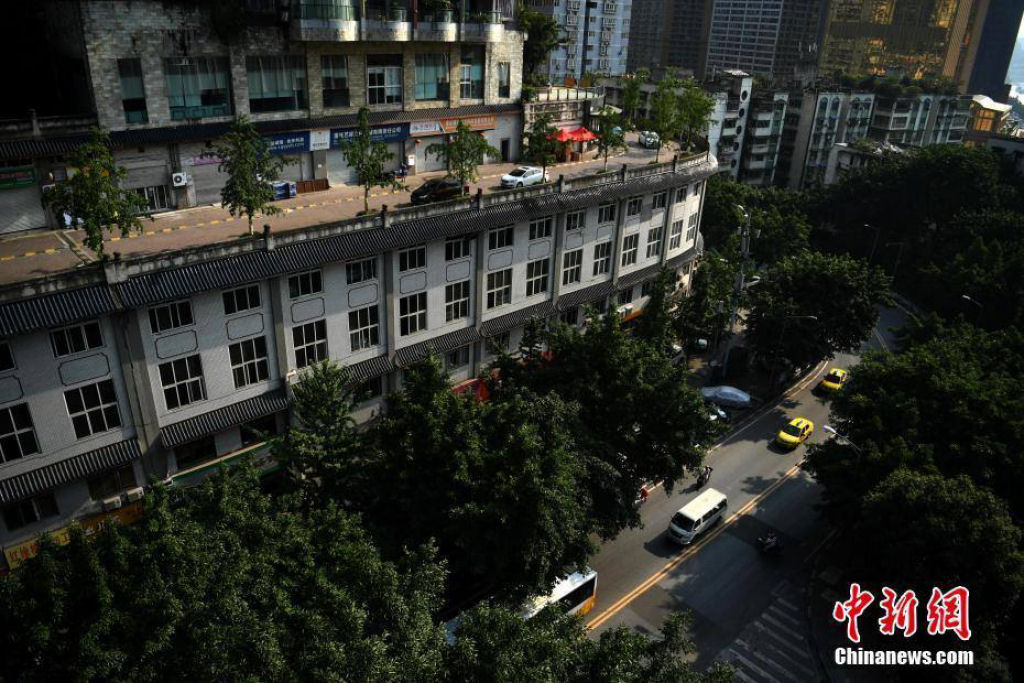 Edifcio de cinco andares na China tem uma rua em sua cobertura