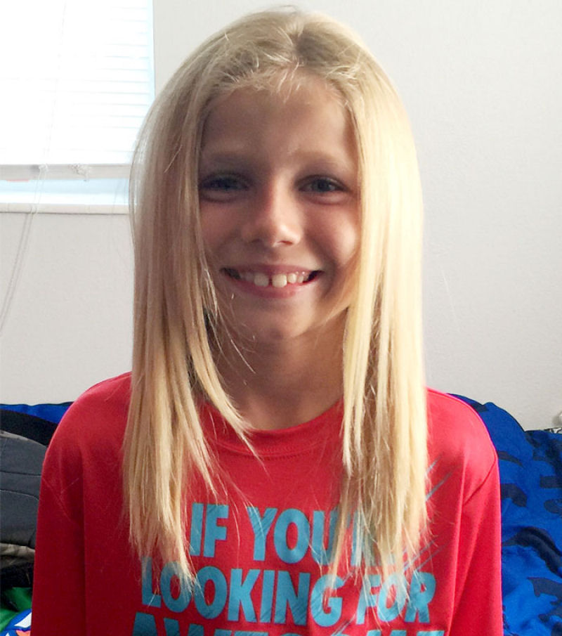 Garoto de 8 anos deixou seu cabelo crescer para doá-lo a crianças com câncer 01