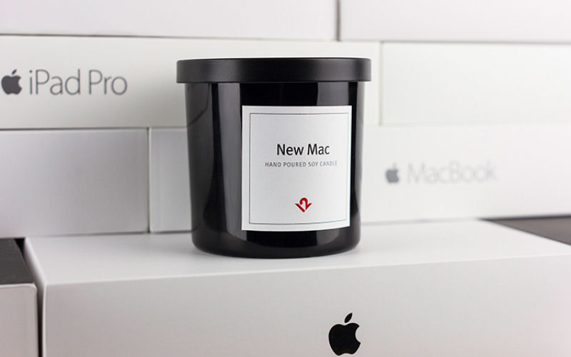 Lanada uma vela com aroma de produtos de Apple recm-abertos