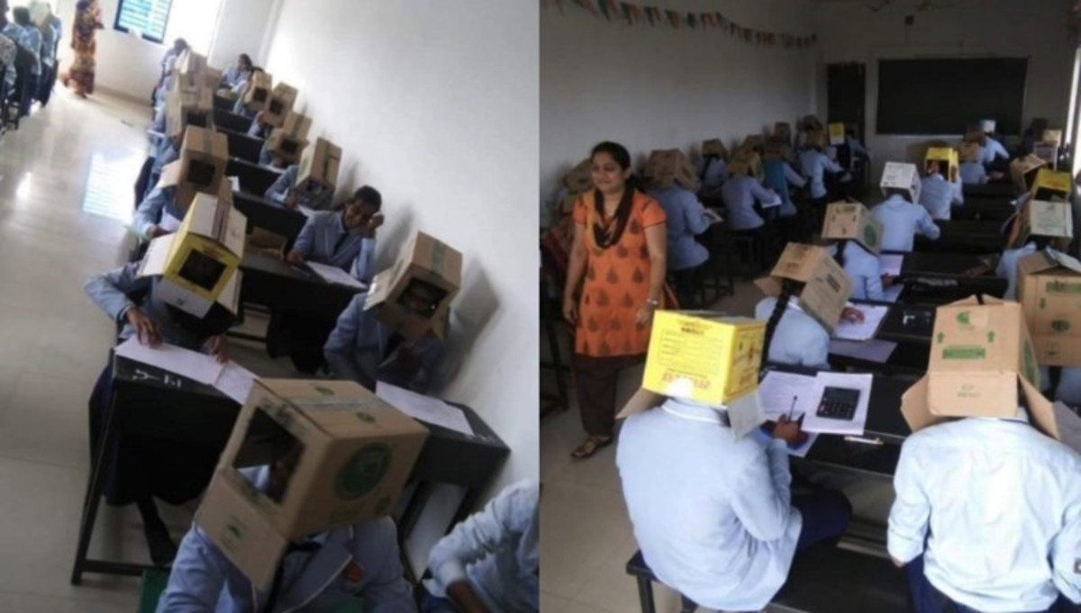 Colgio indiano faz com que alunos usem caixas de papelo nas cabeas para evitar a cola