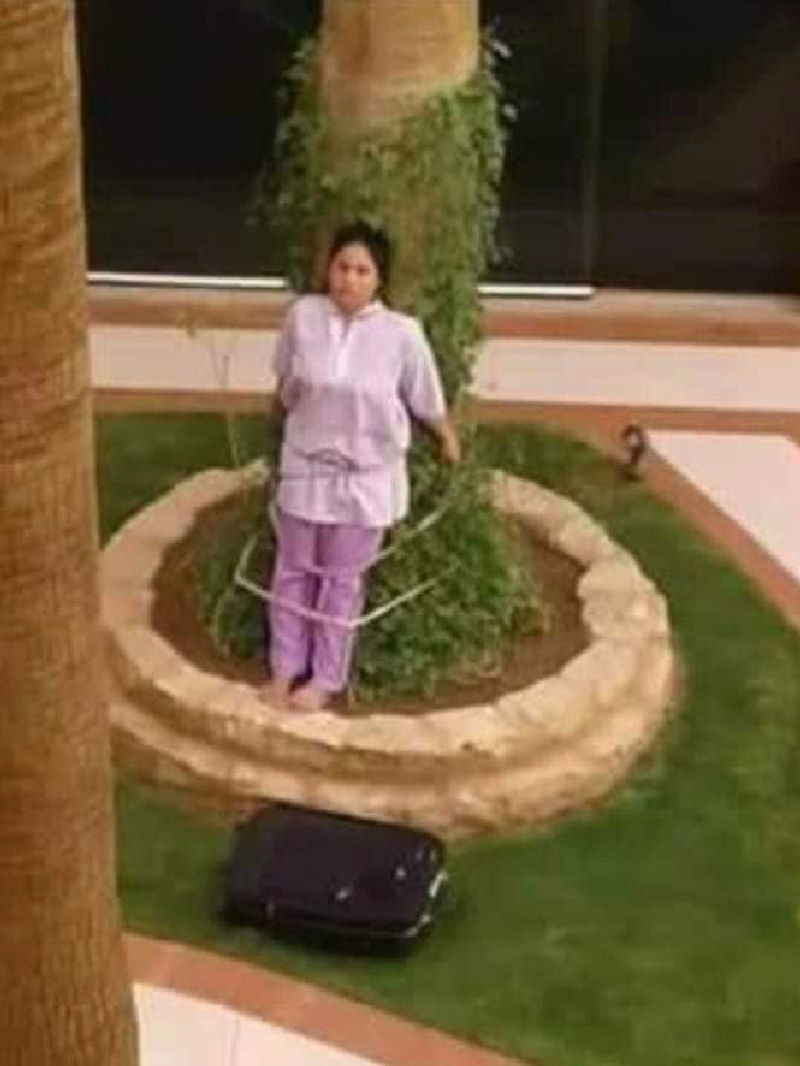 Domstica filipina  amarrada a uma rvore por famlia saudita endinheirada, como castigo