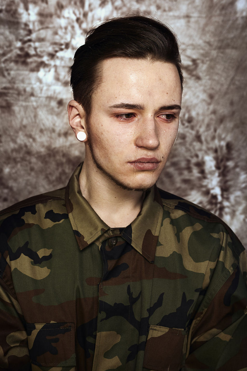 14 expressivos retratos de homens reagindo ao novo servio militar obrigatrio na Litunia 06