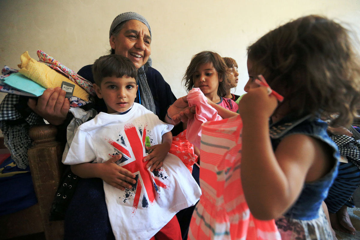 Senhora iraquiana cuida de 22 netos aps jihadistas matarem cinco de seus filhos 10
