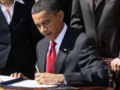 Como Obama assina os documentos oficiais