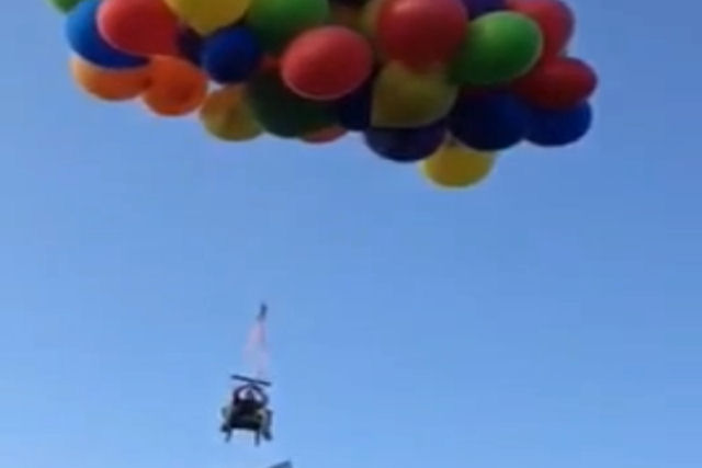 Canadense é acusado de vandalismo depois de voar em uma cadeira de jardim amarrada a centenas de balões