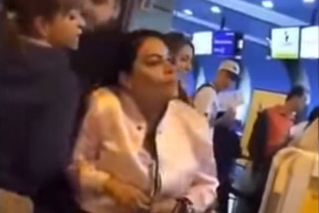 Colombiana protagoniza um escndalo depois de descobrir o marido com sua amante no aeroporto
