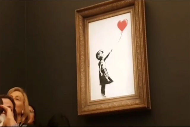 Trollagem pica: obra de Banksy se autodestroi depois de ser leiloada por $1.250.000