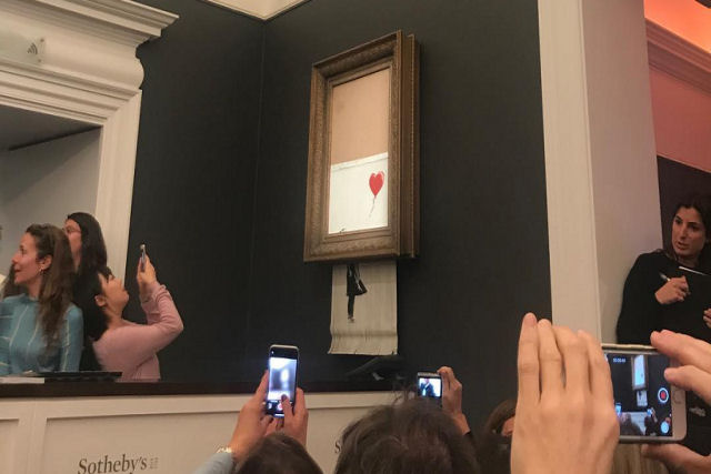 Banksy posta o vdeo com o processo inteiro da obra autodestruda depois de leiloada por mais de um milho de dlares