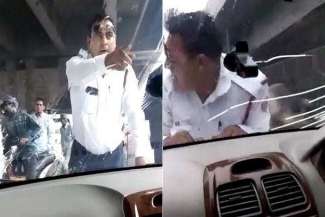 'Rpidos e furiosos': policial  arrastado sobre o cap do carro quando tentava prender um suspeito