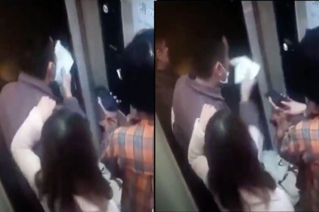 Chinês cospe deliberadamente em lenços sobre botões de elevador em meio à crise do vírus de Wuhan