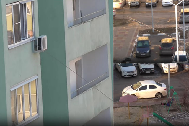 Pai russo 'muito ocupado' impulsiona o balano da filha na rua desde o quarto andar