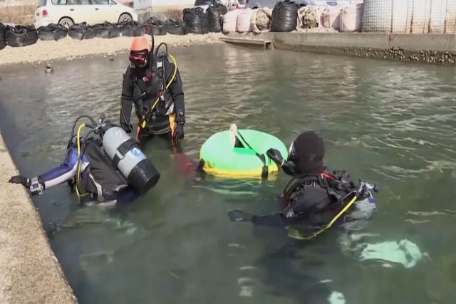 Japonês aprendeu a mergulhar para buscar os restos da esposa desaparecida no tsunami de 2011