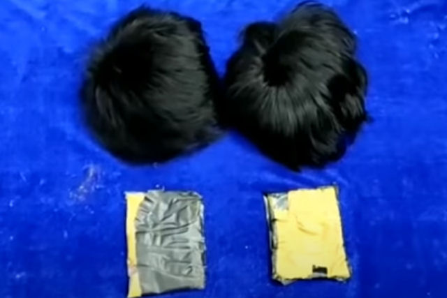 Contrabandistas indianos são presos tentando ingressar ouro e dinheiro sob perucas