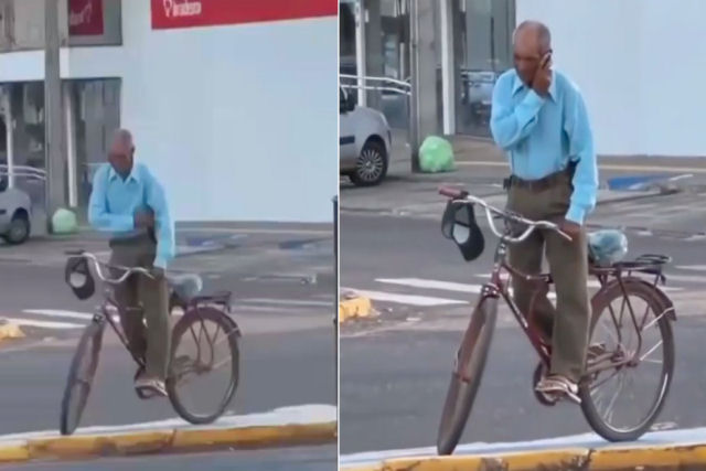 Ciclista mostra como atender o celular sem violar as regras de trânsito