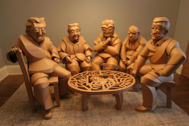 As belas esculturas de papelão em tamanho natural de personagens chineses