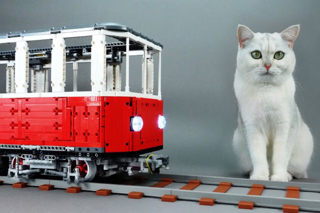 Um trem LEGO projetado para transportar gatos